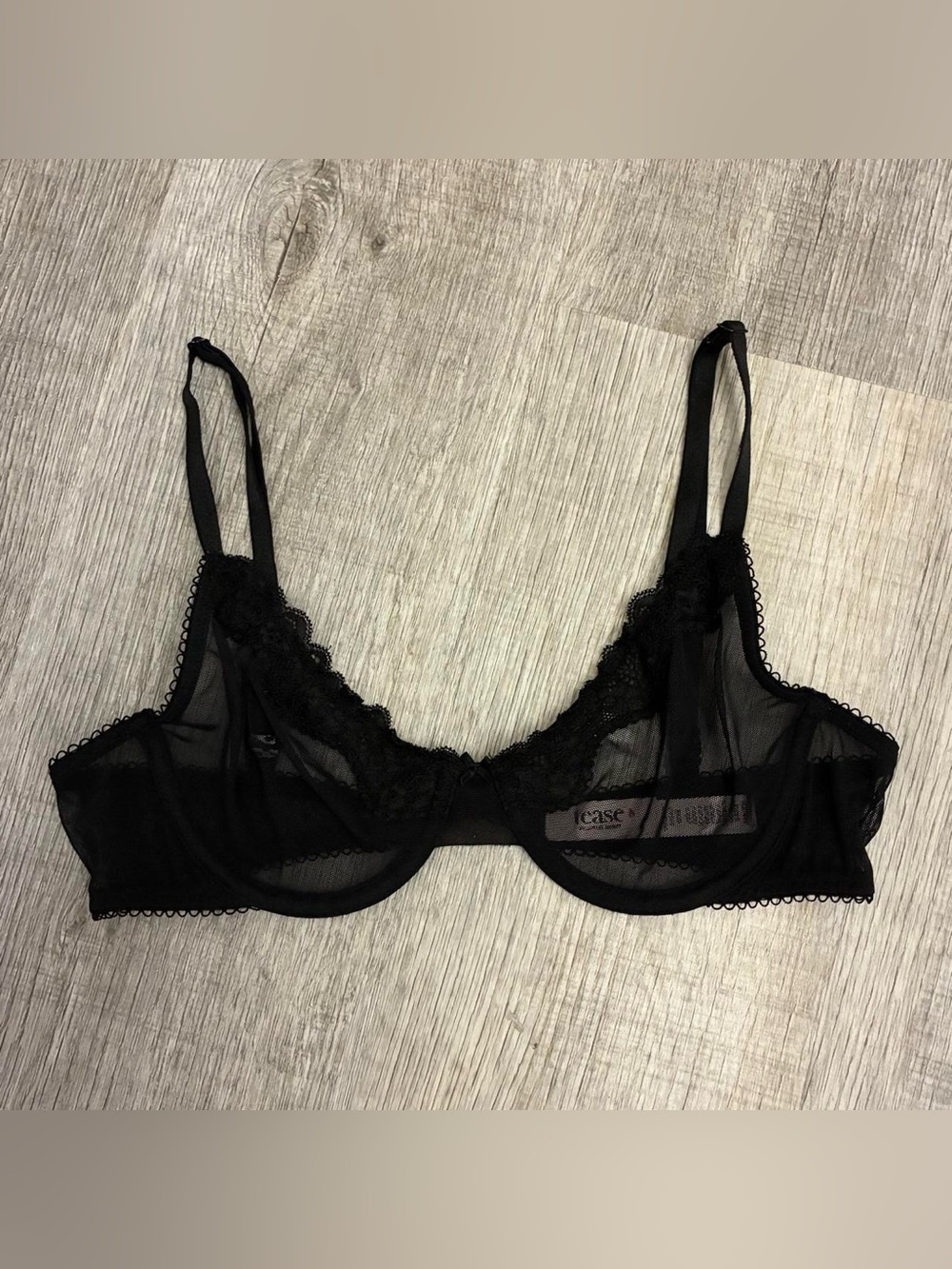 Victoria’s Secret black with lace trim unlined demi bra